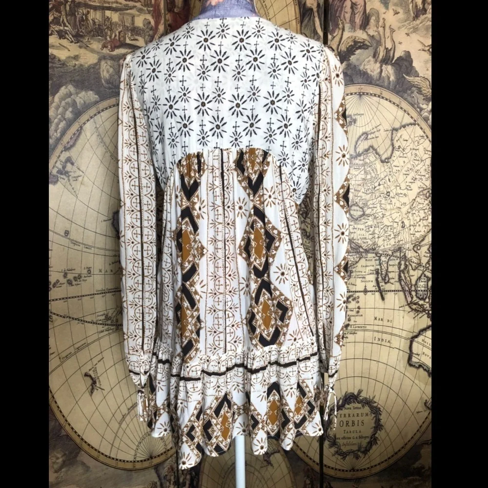 Free people Mixed print tunic. Size s